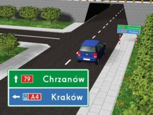 Znak "drogowskaz tablicowy umieszczany obok jezdni przed wjazdem na autostradę"